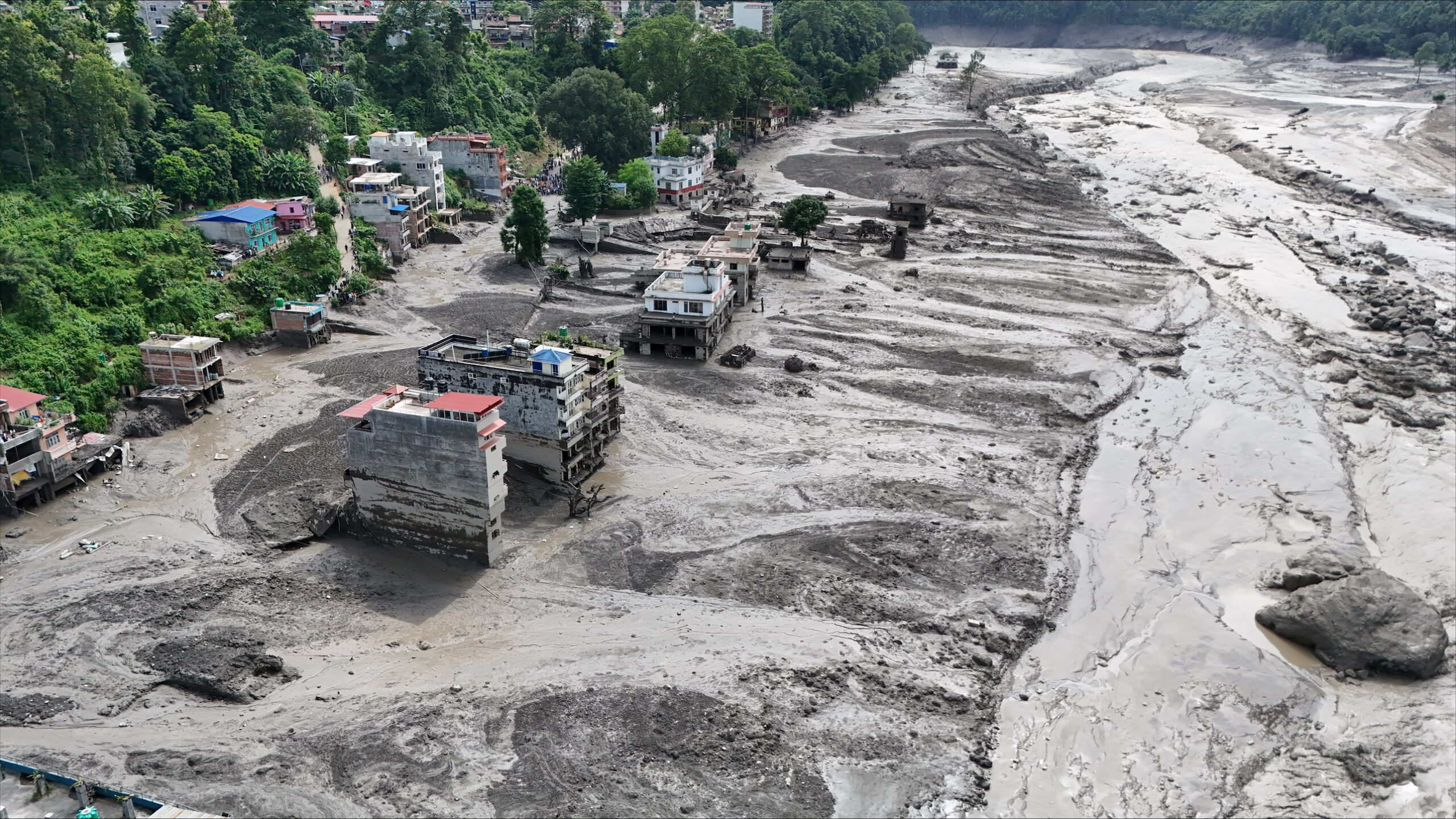 Views of settlements in central northern Nepal covered in mud following the devastating flash floods that swept through the area on 26 August, causing widespread destruction to homes, roads and other infrastructure.